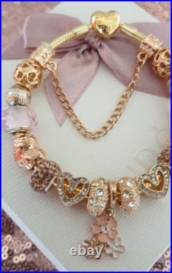 Gold Pandora Bracelet Heart Clasp. & Gold Charms with Pandora gift Box. 19 cms