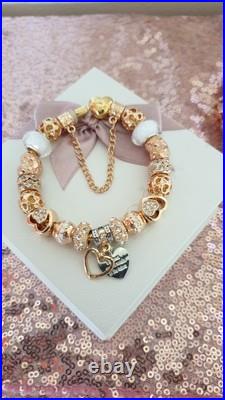 Gold Pandora Bracelet Heart Clasp. & Gold Charms with Pandora gift Box. 19 cms Gold Pandora Bracelet Heart Clasp. & Gold Charms with Pandora gift Box. 19 cms