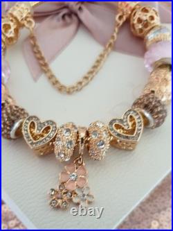 Gold Pandora Bracelet Heart Clasp. & Gold Charms with Pandora gift Box. 19 cms