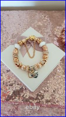 Gold Pandora Bracelet Heart Clasp. & Gold Charms with Pandora gift Box. 19 cms Gold Pandora Bracelet Heart Clasp. & Gold Charms with Pandora gift Box. 19 cms