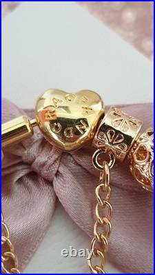 Gold Pandora Bracelet Heart Clasp. & Gold Charms with Pandora gift Box. 19 cms Gold Pandora Bracelet Heart Clasp. & Gold Charms with Pandora gift Box. 19 cms