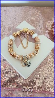 Gold Pandora Bracelet Heart Clasp. & Gold Charms with Pandora gift Box. 19 cms Gold Pandora Bracelet Heart Clasp. & Gold Charms with Pandora gift Box. 19 cms