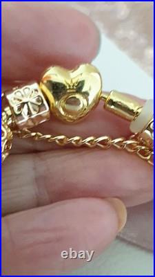 Gold Pandora Bracelet Heart Clasp. & Gold Charms with Pandora gift Box. 19 cms Gold Pandora Bracelet Heart Clasp. & Gold Charms with Pandora gift Box. 19 cms