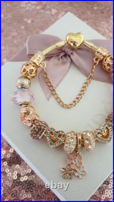 Gold Pandora Bracelet Heart Clasp. & Gold Charms with Pandora gift Box. 19 cms