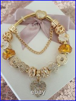 Gold Pandora Bracelet Pave Heart & Gold Charms with Pandora gift Box. 20 cms Gold Pandora Bracelet Pave Heart & Gold Charms with Pandora gift Box. 20 cms