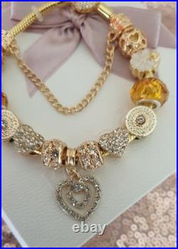 Gold Pandora Bracelet Pave Heart & Gold Charms with Pandora gift Box. 20 cms Gold Pandora Bracelet Pave Heart & Gold Charms with Pandora gift Box. 20 cms