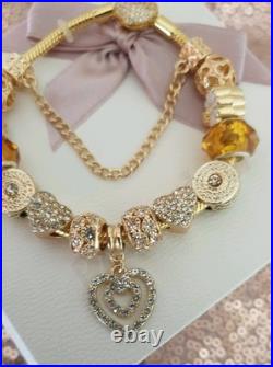 Gold Pandora Bracelet Pave Heart & Gold Charms with Pandora gift Box. 20 cms Gold Pandora Bracelet Pave Heart & Gold Charms with Pandora gift Box. 20 cms