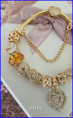 Gold Pandora Bracelet Pave Heart & Gold Charms with Pandora gift Box. 20 cms Gold Pandora Bracelet Pave Heart & Gold Charms with Pandora gift Box. 20 cms