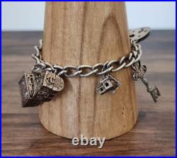 Heavy Vintage Chunky Charm Bracelet Sterling 925 Silver 39.3 grams 8 Charms