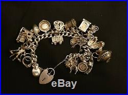 Heavy Vintage Silver Charm Bracelet 27 Charms Nuvo & Opening Charms 115 grams
