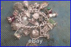 Heavy vintage silver charm bracelet with charms. 1970s