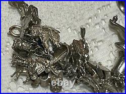 Heavy vintage sterling silver charm bracelet & 44 charms
