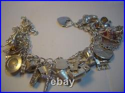 Incrediblemassive Solid Silver Charm Bracelet-vintage Heavy- 7. 27 Unusu Charms