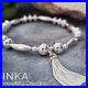 Inka-Sterling-Silver-Chunky-Oval-bead-Stacking-Bracelet-with-Large-Tassel-charm-01-zjv