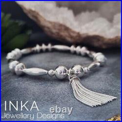 Inka Sterling Silver Chunky Oval bead Stacking Bracelet with Large Tassel charm