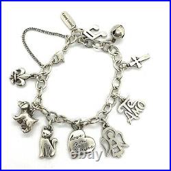 James Avery Sterling Silver Bracelet With 9 Charms. 6.1/2