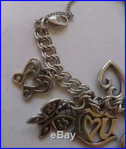 James Avery sterling silver charm bracelet with 13 JA charms some retired 42g