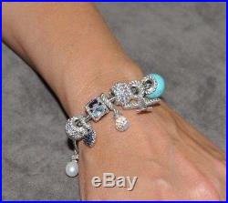 Judith Ripka Silver Charm Bracelet with 11 Charms (TEB)