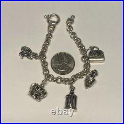 KBN Rolo Charm Bracelet Sterling Silver, 7.5, 43.4 Grams, Rose, Purse, Crown KBN Rolo Charm Bracelet Sterling Silver, 7.5, 43.4 Grams, Rose, Purse, Crown