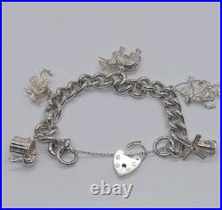 LOVELY 925 STERLING SILVER CHARM BRACELET WITH CHARMS HEAVY (75.92g) 7 INCH