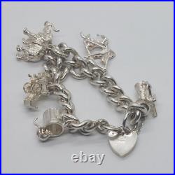 LOVELY 925 STERLING SILVER CHARM BRACELET WITH CHARMS HEAVY (75.92g) 7 INCH