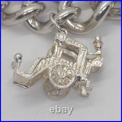 LOVELY 925 STERLING SILVER CHARM BRACELET WITH CHARMS HEAVY (75.92g) 7 INCH