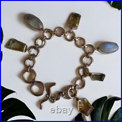 Moonstone 41 gram hallmarked. 925 silver & stone charm bracelet