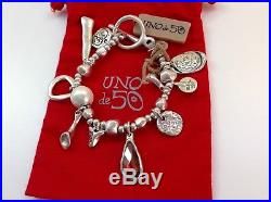 NWT Uno de 50 Silvertone Toggle Bracelet with Red Crystal/Faux Pearl/Charms 7