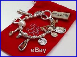NWT Uno de 50 Silvertone Toggle Bracelet with Red Crystal/Faux Pearl/Charms 7
