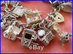 Nuvo Vintage Sterling Silver Charm Bracelet With 25 Nuvo Charms