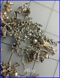 Over 40 Walt Disney Charms 150.25 grams Vintage Sterling Silver Charm Bracelet