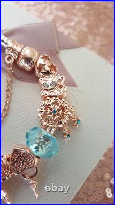 Pandora Bracelet Rose gold Clasp & Rose Gold Charms + Pandora Box. 19 cms long Pandora Bracelet Rose gold Clasp & Rose Gold Charms + Pandora Box. 19 cms long