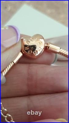 Pandora Bracelet in Rose gold & Rose Gold Charms with Pandora Box. 19 cms long Pandora Bracelet in Rose gold & Rose Gold Charms with Pandora Box. 19 cms long