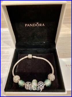 Pandora Genuine Charm Bracelet 7 charms, Never Used, Cert of Authenticity incl