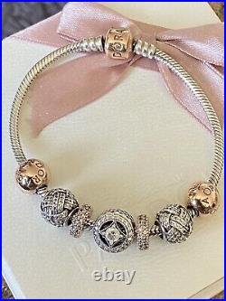 Pandora Rose Gold Clasp Bracelet With 5 Charms And Two Clips