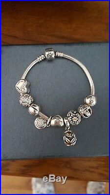 Pandora bracelet with charms used
