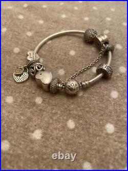 Pandora braclet with 7 charms