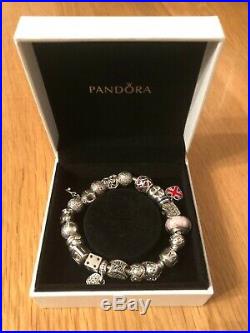 Pandora charm bracelet 19cm with 16 charms, 2 clasps and security chain, boxed