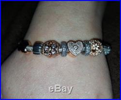 Pandora charms bracelet and rose gold 14c and silver genuine never worn