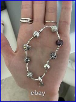 Pandora essence bracelet with charms