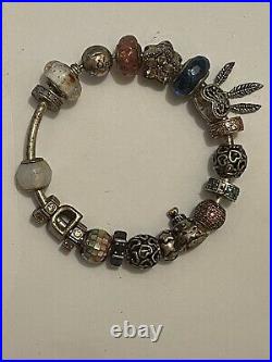 Pandora solid silver bracelet and charms