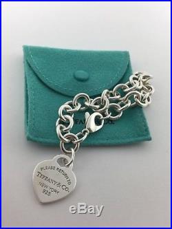 Please return to Tiffany & co. New York sterling silver heart charm bracelet
