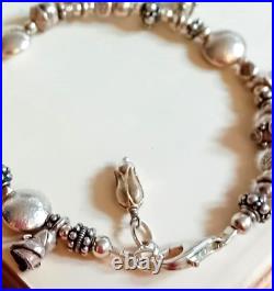 QUIRKY SILVER CHARM BRACELET Heavyweight Silver Textured Beads, Dangles & Charms