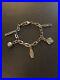 RARE-A-Retired-Piece-by-Tiffany-Co-Sterling-Silver-5-Charm-Bracelet-01-pc
