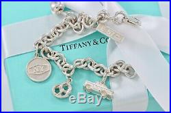 RARE Tiffany & Co. Silver New York Themed Cab Pretzel Apple Charm 7.5 Bracelet