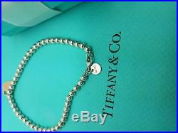 Return To Tiffany & Co Silver 4mm Bead Bracelet with Rubedo Heart Tag Charm 7.5