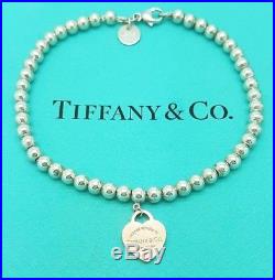 Return To Tiffany & Co Silver 4mm Bead Bracelet with Rubedo Heart Tag Charm 7.5