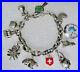 STERLING-SILVER-CHARM-BRACELET-Vtg-Ireland-Switzerland-Charms-20cm-Length-01-bt