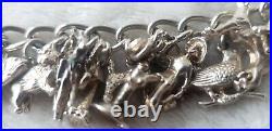 STERLING SILVER CHARM BRACELET WITH 23 UNUSUAL CHARMS 7.5 62.7 g