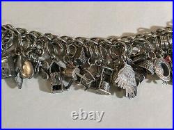 STUNNING Vintage Sterling Silver CHARM BRACELET 31 Charms 94.4 grams CHUNKY